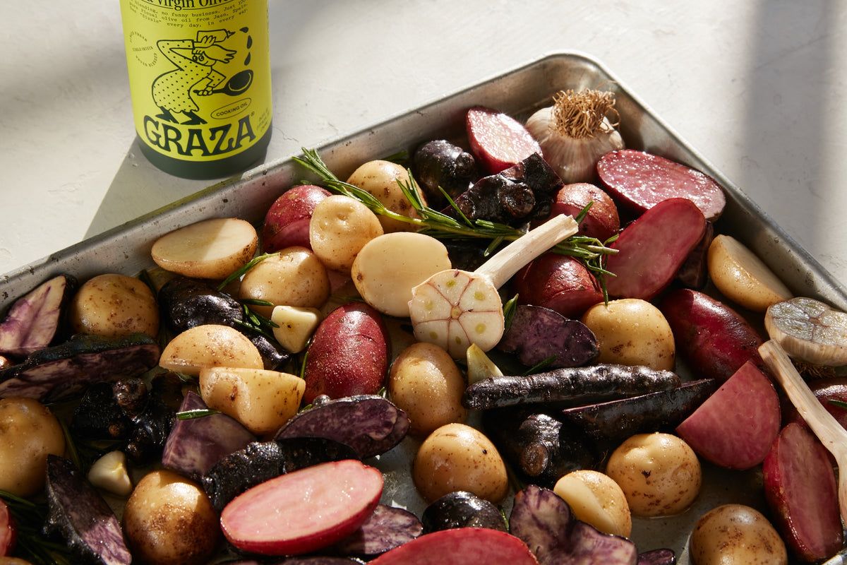 “Sizzle” beside potatoes ready to roast